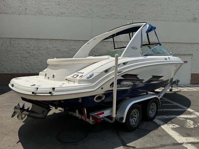 Slide: The Image of 2009 Chaparral SSX 236 boat on trailer, parked outdoors. - 4