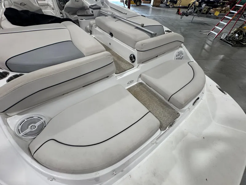 Slide: The Image of 2013 Rinker 276 Captiva Bowrider interior seating and deck area. - 23