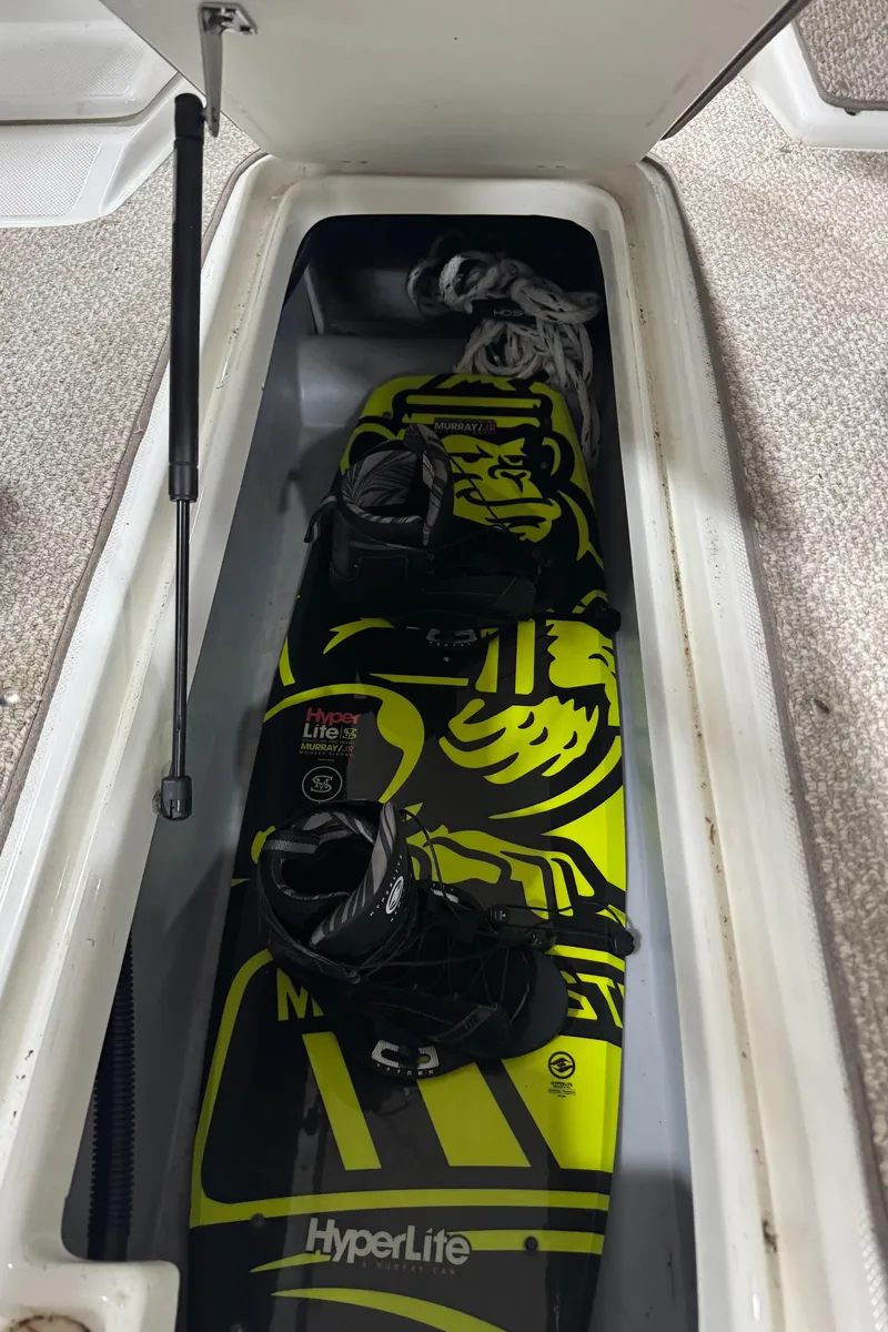 Slide: The Image of Wakeboard stored in 2013 Rinker 276 Captiva Bowrider compartment. - 43
