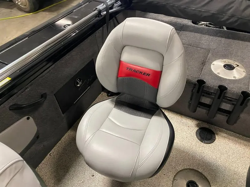 Slide: The Image of 2014 Tracker Targa V-18 WT boat seat with gray and red upholstery. - 7