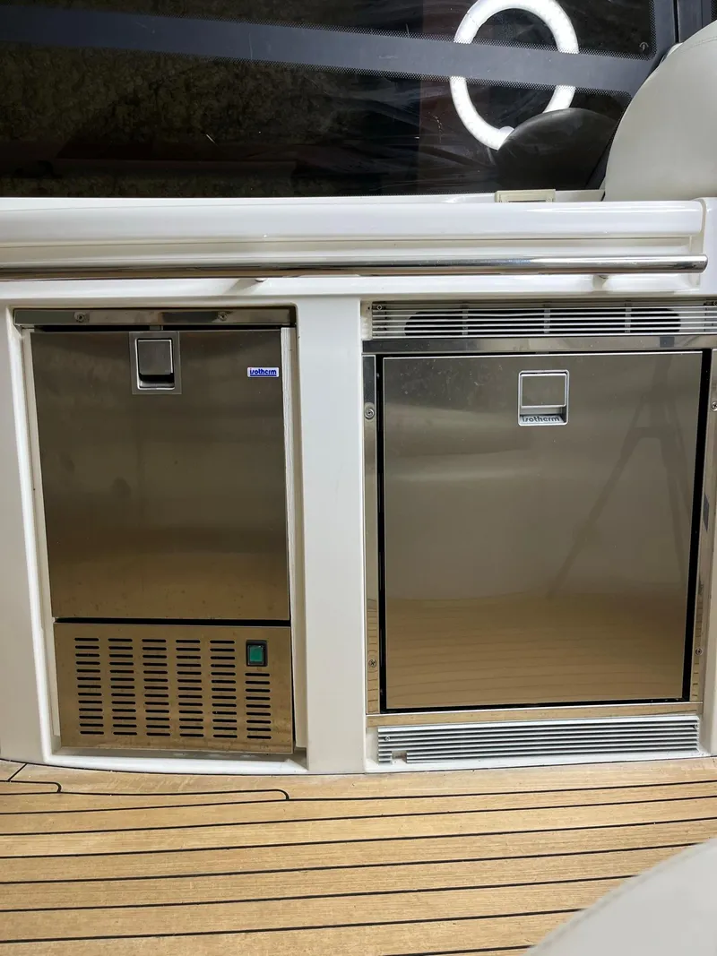 Slide: The Image of Stainless steel appliances on 2002 Sunseeker Predator 61 yacht deck. - 26