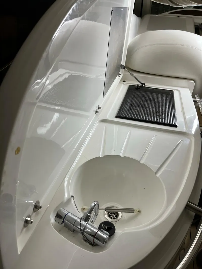 Slide: The Image of Sunseeker Predator 61 yacht sink and grill area, 2002 model. - 27