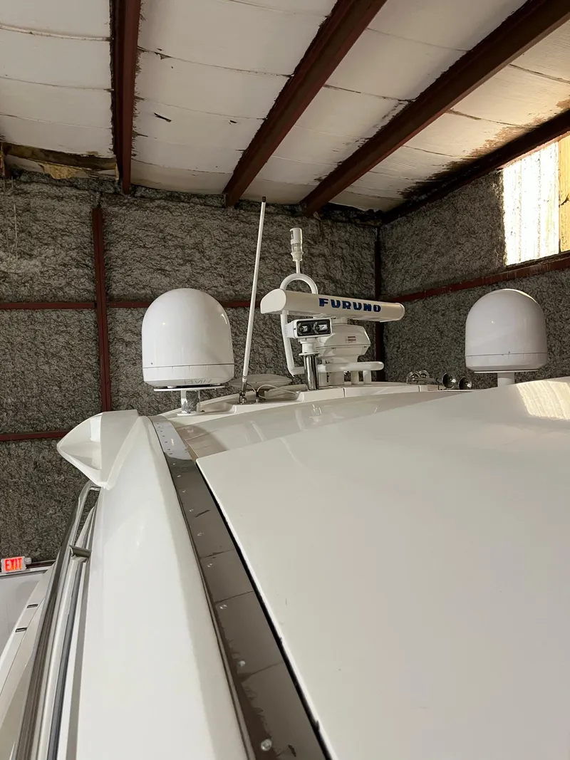 Slide: The Image of 2002 Sunseeker Predator 61 yacht radar equipment in a storage facility. - 33