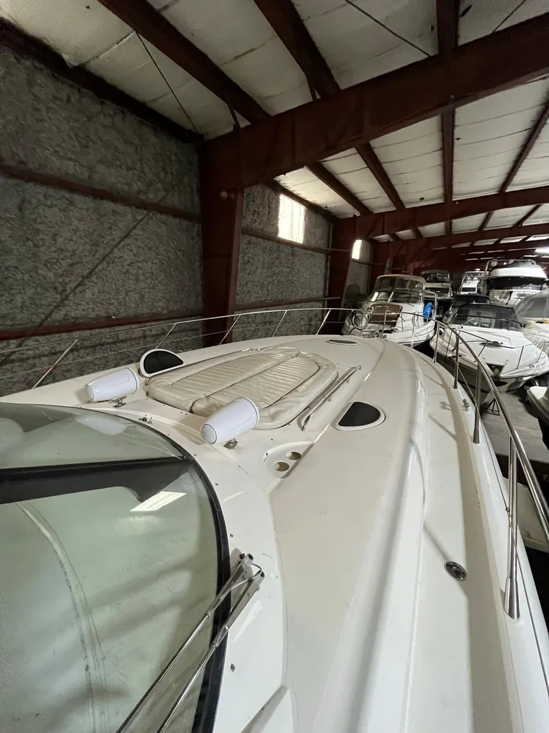 Slide: The Image of 2002 Sunseeker Predator 61 yacht in indoor storage facility. - 34