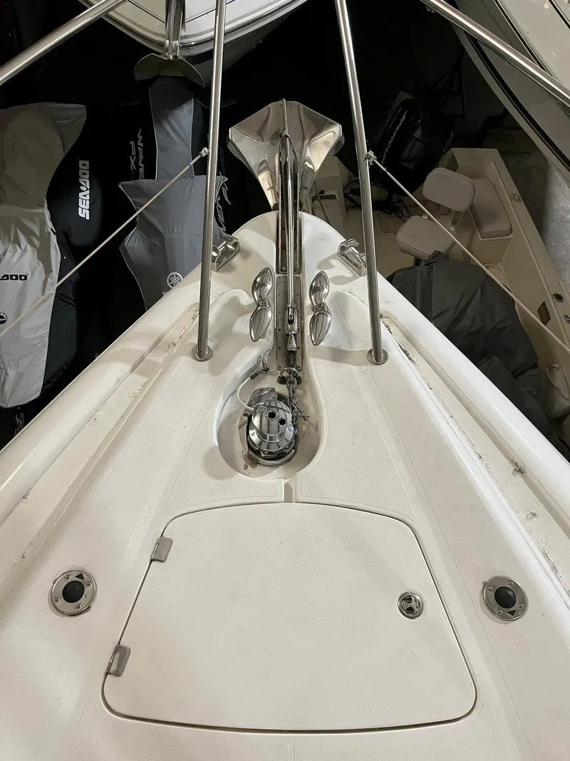 Slide: The Image of 2002 Sunseeker Predator 61 yacht bow with anchor and stainless steel fittings. - 35