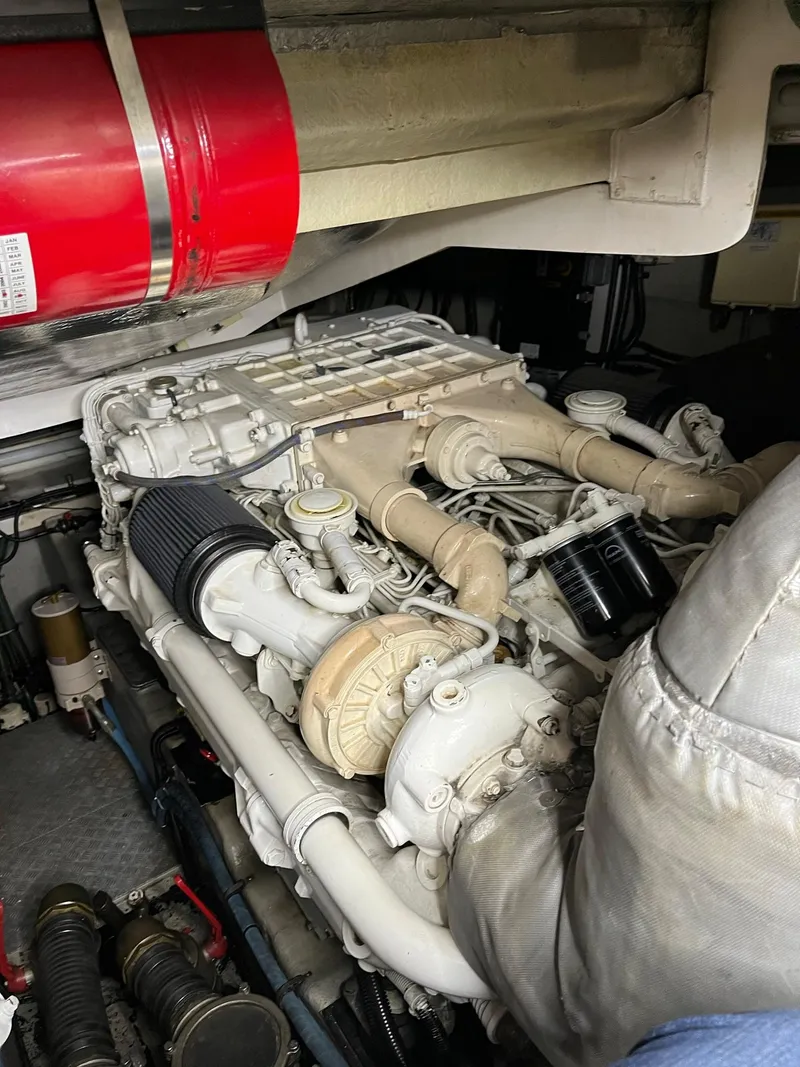 Slide: The Image of Engine compartment of 2002 Sunseeker Predator 61 yacht, showcasing detailed machinery components. - 41