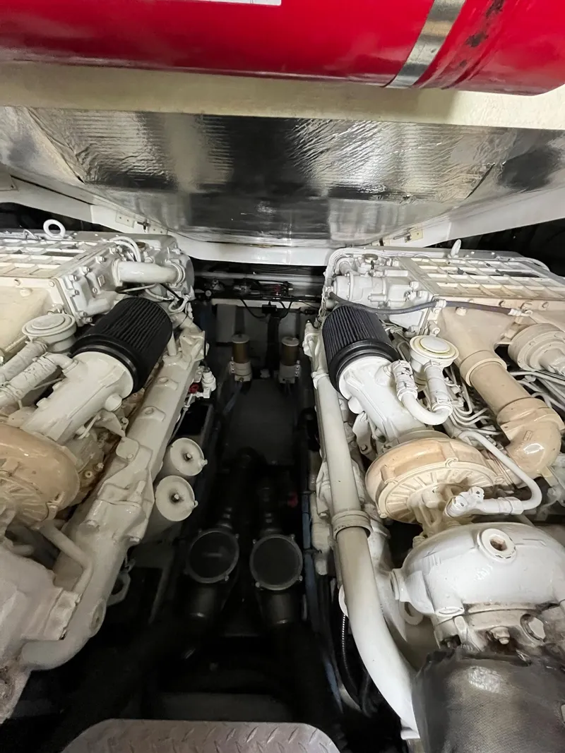 Slide: The Image of Engine room of 2002 Sunseeker Predator 61 yacht, showcasing dual engines. - 42