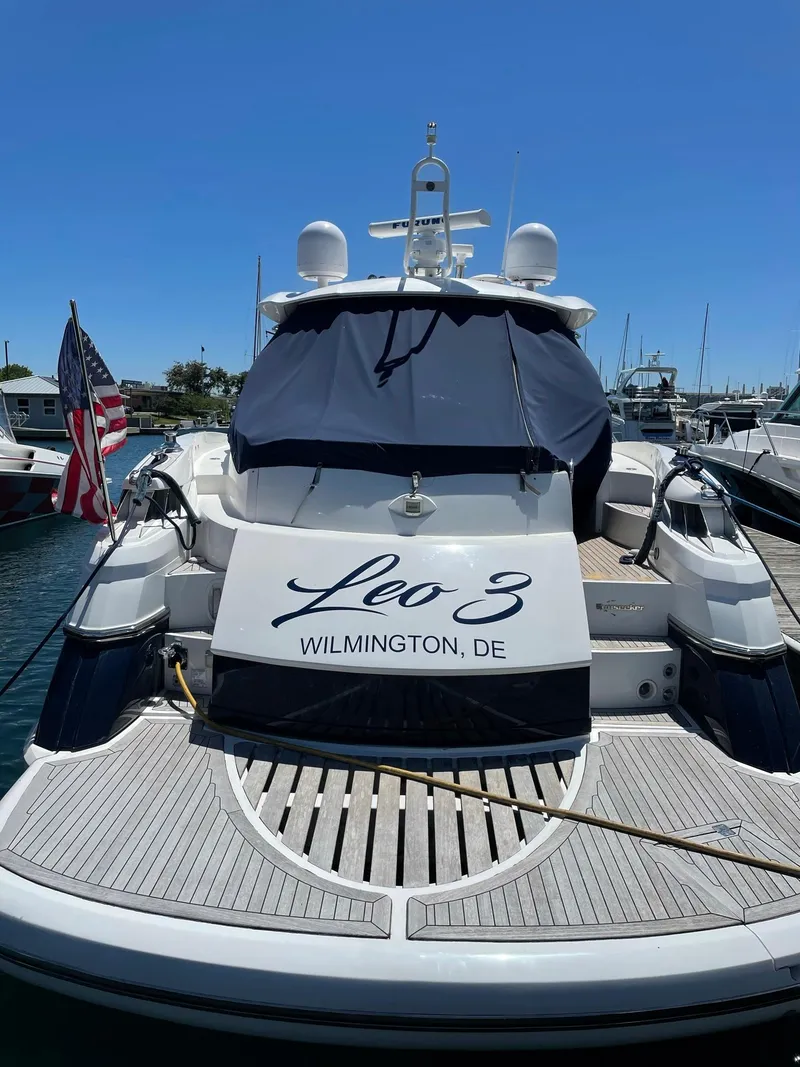 Slide: The Image of 2002 Sunseeker Predator 61 yacht docked, named "Leo 3," Wilmington, DE. - 8