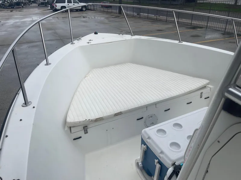 Slide: The Image of 2000 Hydra-Sports 212 Seahorse boat with cushioned bow seating and cooler on deck. - 12