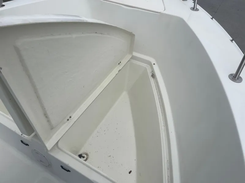 Slide: The Image of Open storage compartment on 2000 Hydra-Sports 212 Seahorse boat. - 13