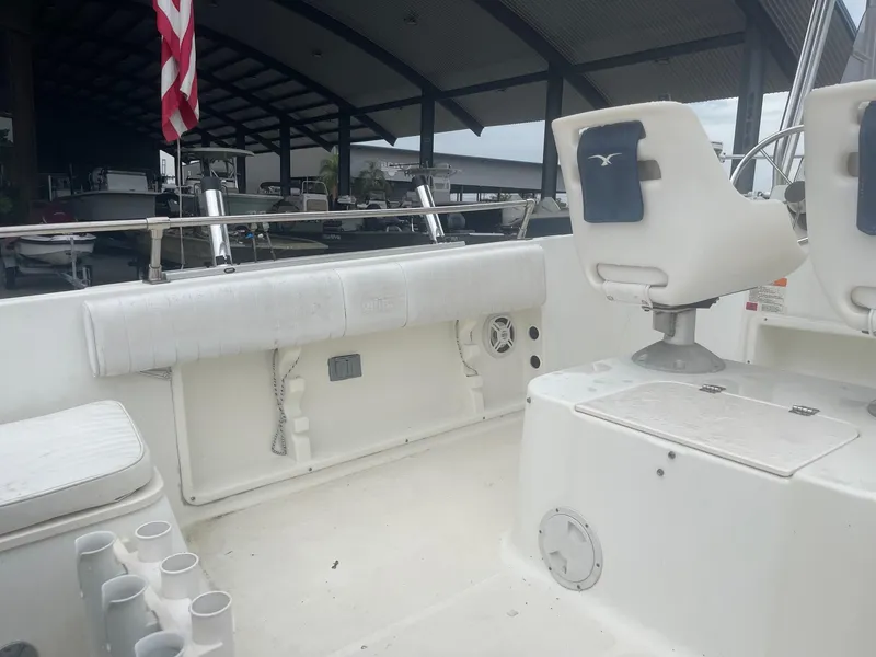 Slide: The Image of 2000 Hydra-Sports 212 Seahorse boat interior with seating and storage. - 17