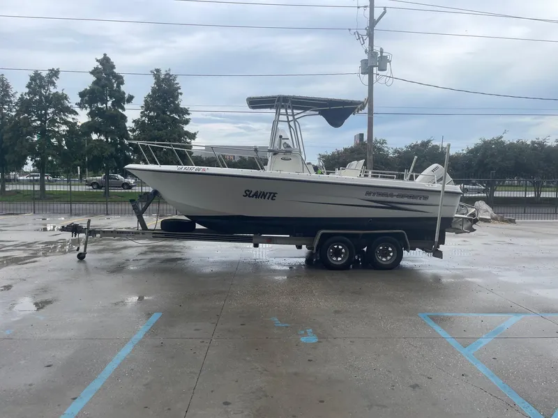 Slide: The Image of 2000 Hydra-Sports 212 Seahorse boat on trailer in parking lot. - 5