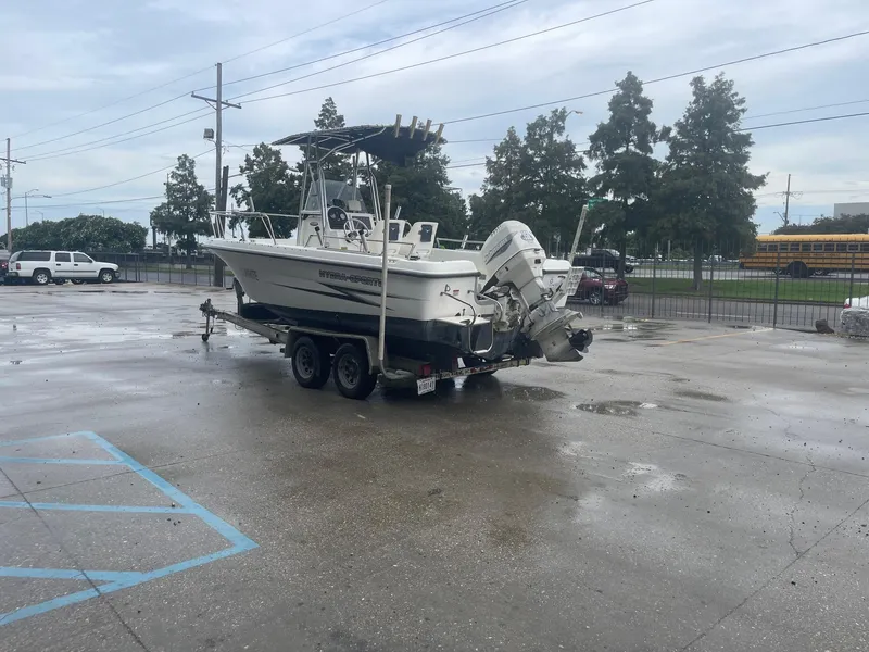 Slide: The Image of 2000 Hydra-Sports 212 Seahorse boat on trailer in parking lot. - 6