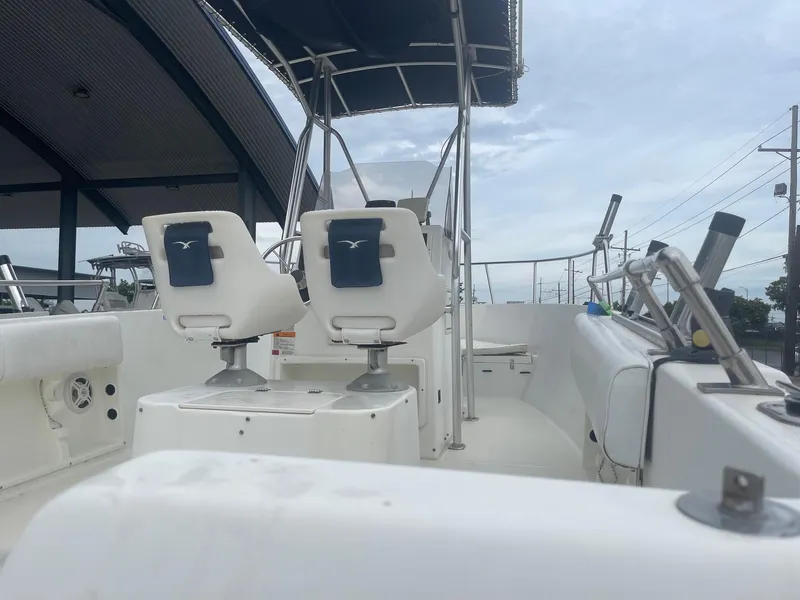 Slide: The Image of 2000 Hydra-Sports 212 Seahorse boat interior with seating and canopy. - 8