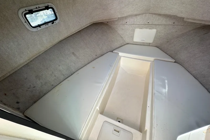 Slide: The Image of Interior cabin of a 2004 Parker 2520 Deep Vee Sport Cabin boat. - 15