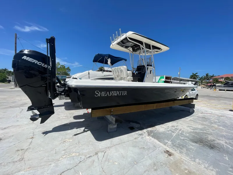 Slide: The Image of 2011 ShearWater 25LTZ boat with Mercury engine on a sunny day. - 8