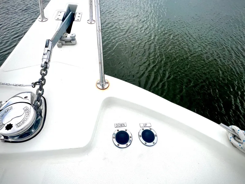 Slide: The Image of 1986 Chris-Craft 480 Corinthian boat deck with anchor and water view. - 21