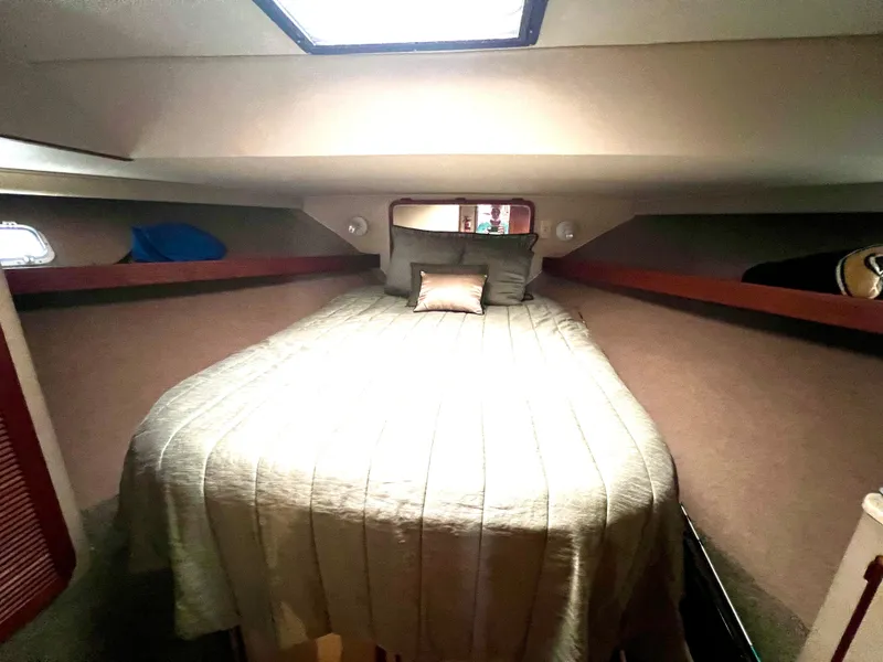 Slide: The Image of 1986 Chris-Craft 480 Corinthian cabin interior with cozy bed and soft lighting. - 45