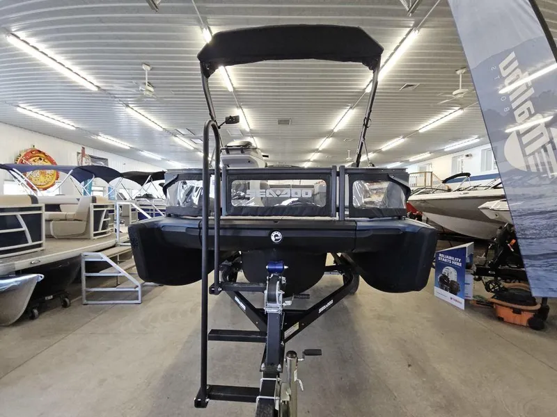 Slide: The Image of 2024 Sea-Doo Switch® Sport Compact 170 hp displayed in a showroom. - 6