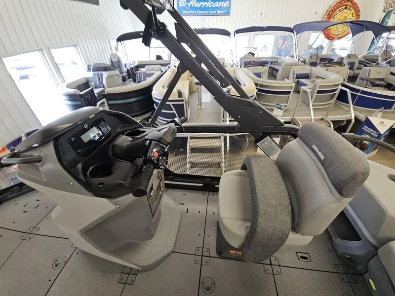 Slide: The Image of 2024 Sea-Doo Switch Sport Compact interior with steering console and seating. - 9