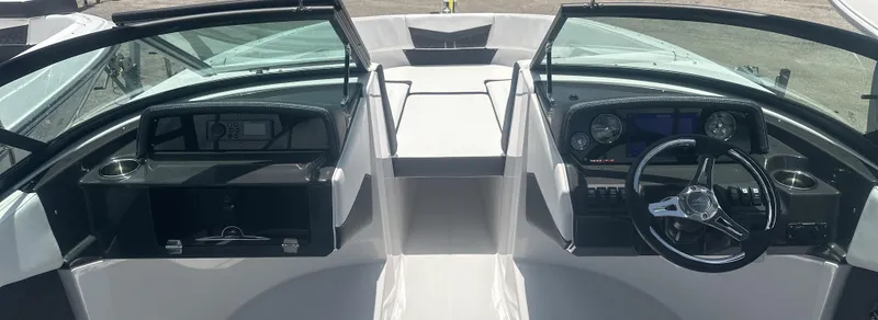 Slide: The Image of 2025 Monterey M-205 boat interior with dual consoles and steering wheel. - 16