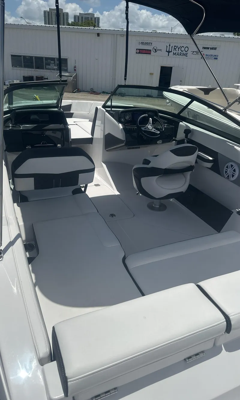 Slide: The Image of 2025 Monterey M-205 boat interior with seating and steering wheel. - 8