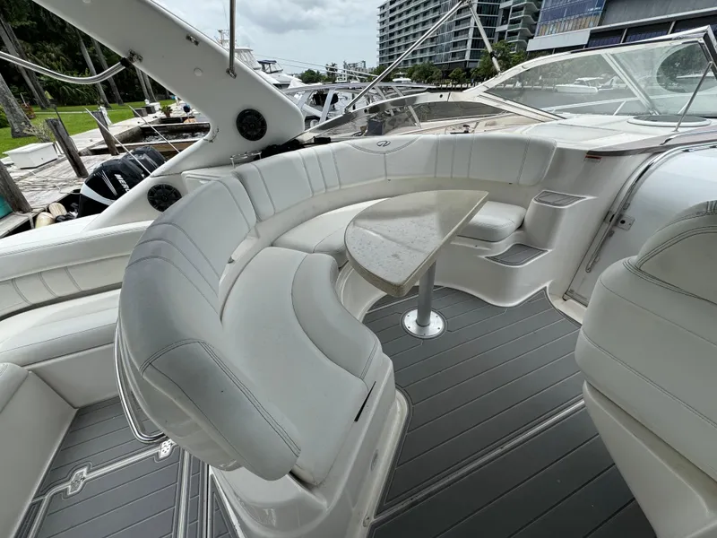 Slide: The Image of Luxurious seating area on 2003 Regal Commodore 3860 yacht with sleek design. - 21