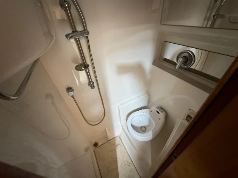 Slide: The Image of Bathroom interior of 2003 Regal Commodore 3860 yacht with shower and toilet. - 35