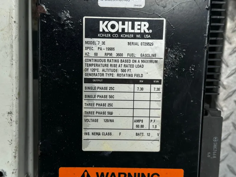 Slide: The Image of Kohler generator label on 2003 Regal Commodore 3860, model 7.3E, gasoline-powered. - 40