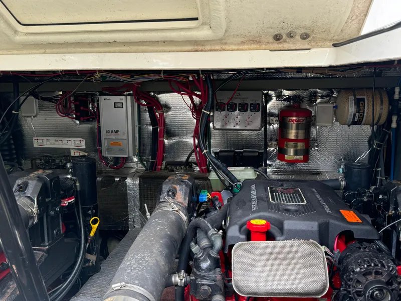 Slide: The Image of Engine room of 2003 Regal Commodore 3860 with visible components and wiring. - 41