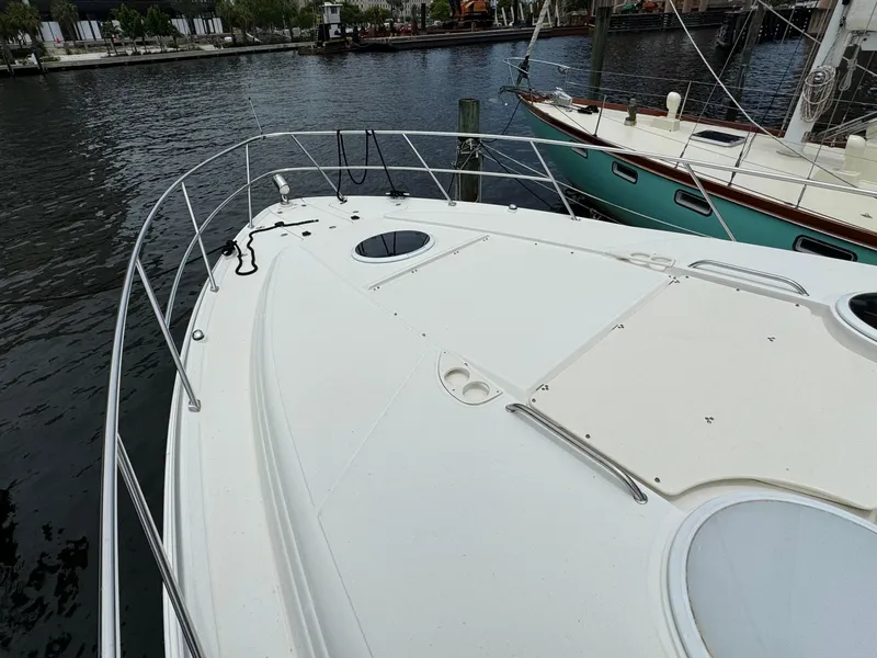 Slide: The Image of 2003 Regal Commodore 3860 yacht bow view at marina dock. - 43