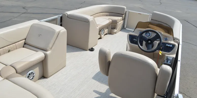 Slide: The Image of 2018 Tahoe LTZ 2285 CR boat dashboard with steering wheel and controls. - 10