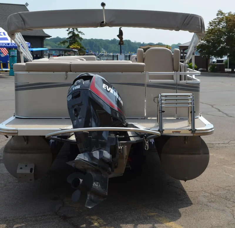 Slide: The Image of 2018 Tahoe LTZ 2285 CR pontoon boat with beige interior and spacious seating. - 12