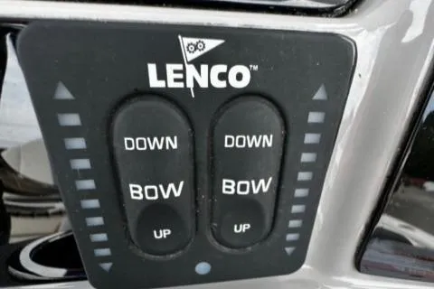 Slide: The Image of Lenco trim tab control panel on 2022 Robalo R230 Center Console boat. - 19
