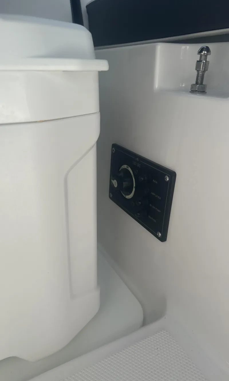 Slide: The Image of 2025 Monterey M-225 boat interior with spacious seating and modern design. - 20