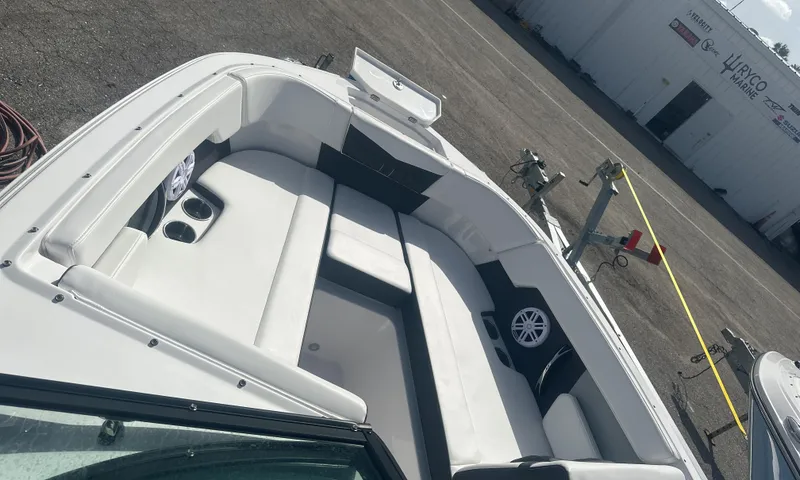 Slide: The Image of 2025 Monterey M-225 boat with sleek design and spacious seating. - 22