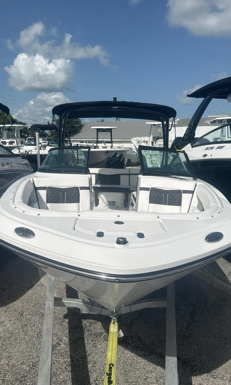 Slide: The Image of 2025 Monterey M-225 boat emblem on white surface. - 3