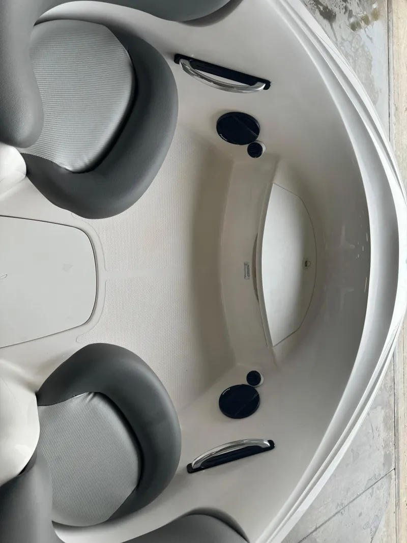 Slide: The Image of Interior of a 1998 Yamaha Boats Exciter, featuring seating and speaker system. - 5