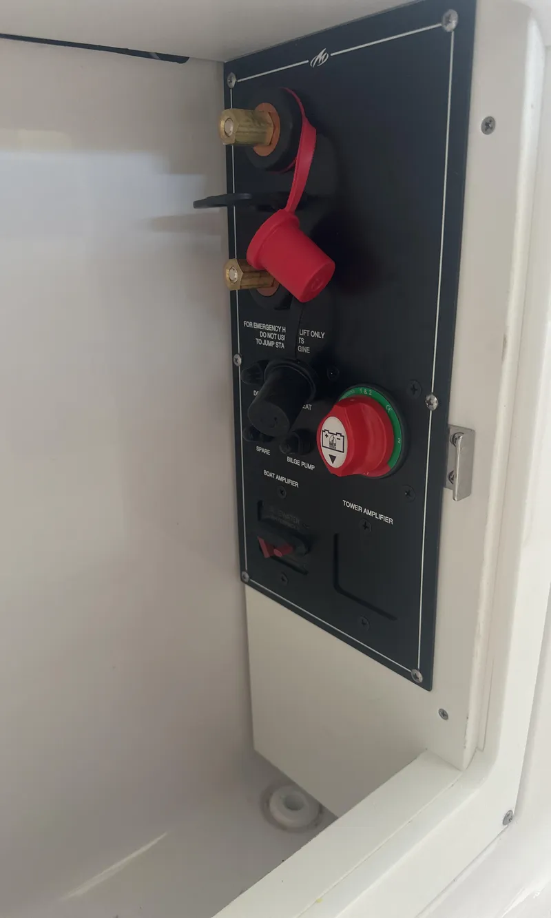 Slide: The Image of Control panel of a 2025 Monterey M45 boat with switches and connectors. - 17