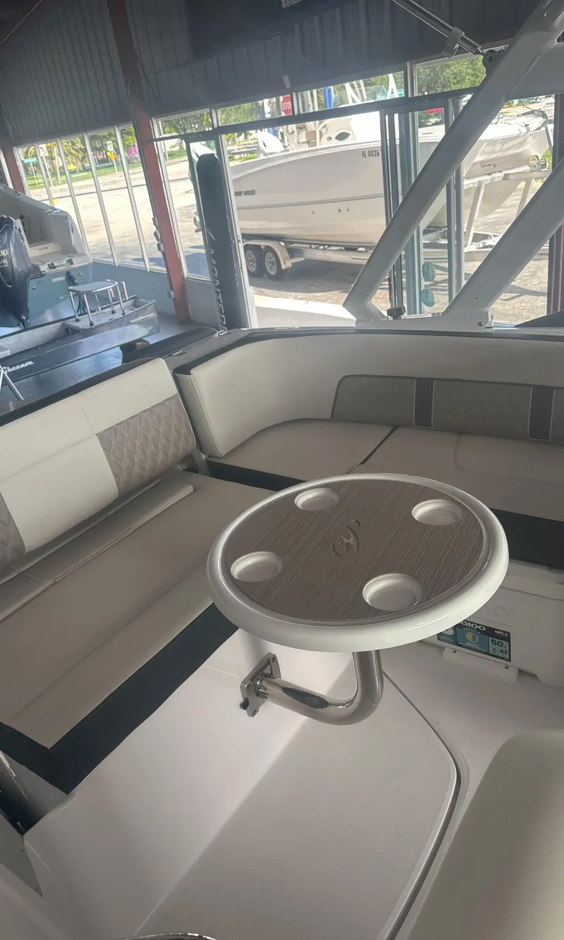 Slide: The Image of 2025 Monterey M45 boat interior with seating and round table. - 19