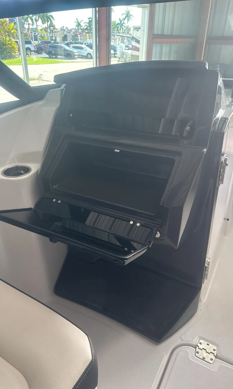 Slide: The Image of 2025 Monterey M45 boat interior with open storage compartment. - 28