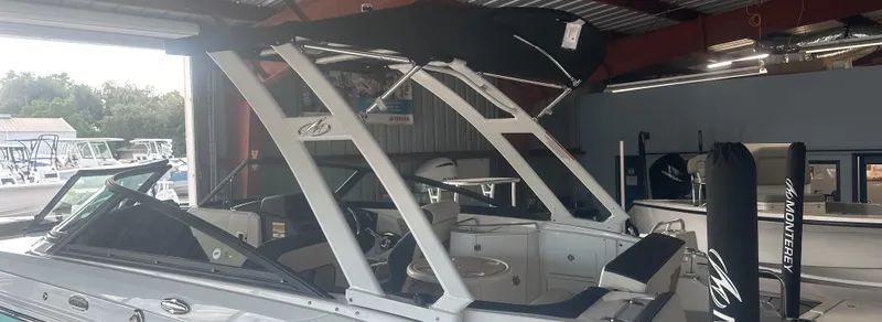 Slide: The Image of 2025 Monterey M45 boat in a showroom, featuring sleek design and modern amenities. - 41