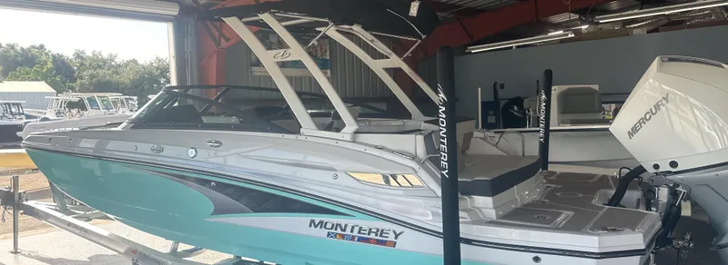 Slide: The Image of 2025 Monterey M45 boat in showroom, featuring sleek design and modern features. - 7