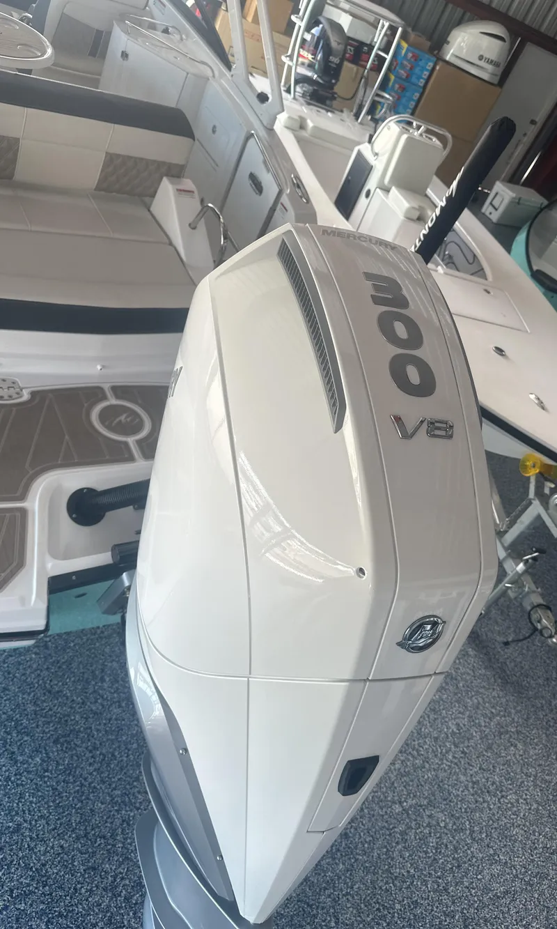 Slide: The Image of 2025 Monterey M45 boat with 300 V8 engine in showroom. - 8