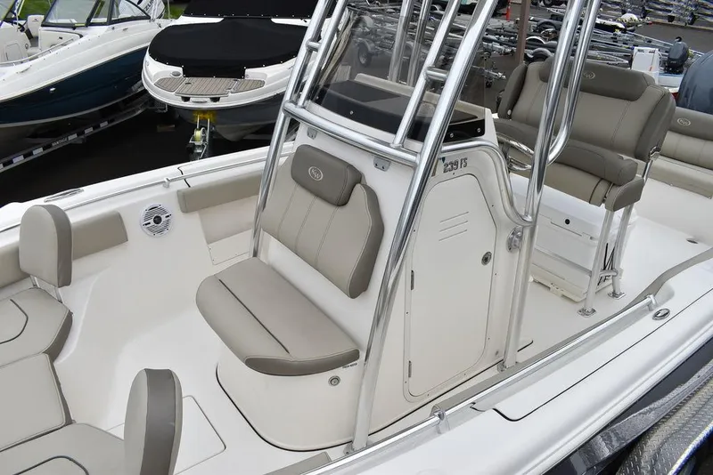 Slide: The Image of 2025 Key West 239 FS boat interior with seating and console. - 16