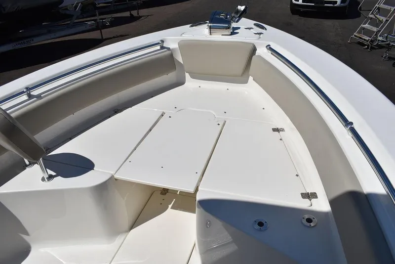 Slide: The Image of 2025 Key West 239 FS boat interior with spacious seating and sleek design. - 19