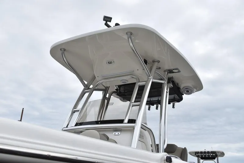 Slide: The Image of 2025 Key West 239 FS boat with T-top against cloudy sky. - 20