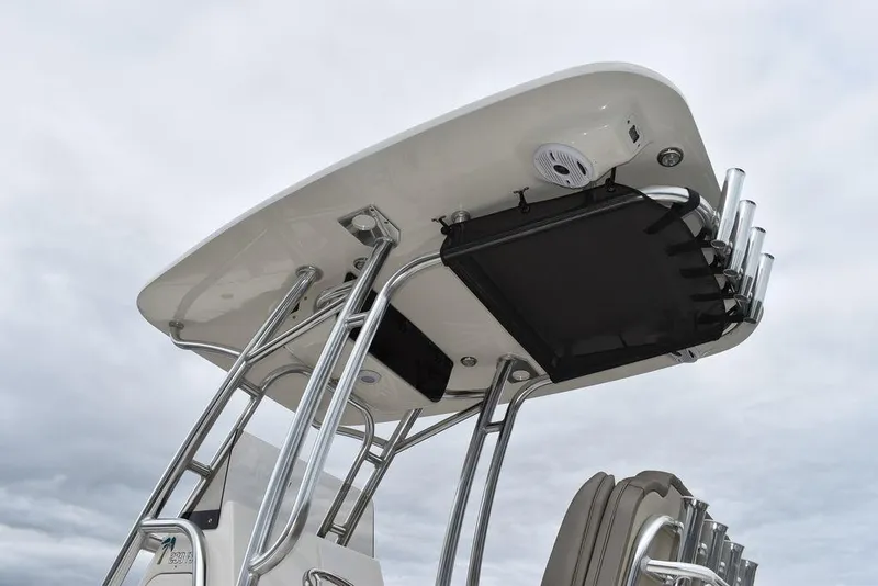 Slide: The Image of 2025 Key West 239 FS boat T-top with rod holders and speaker. - 21