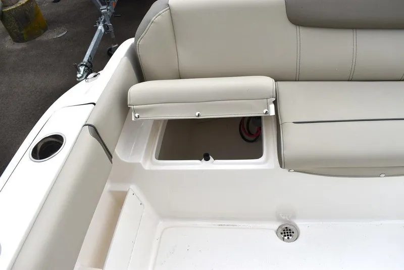 Slide: The Image of 2025 Key West 239 FS boat seat with storage compartment and cup holder. - 26