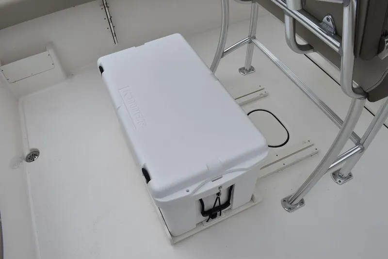 Slide: The Image of White cooler on 2025 Key West 239 FS boat deck, near metal seating frame. - 29